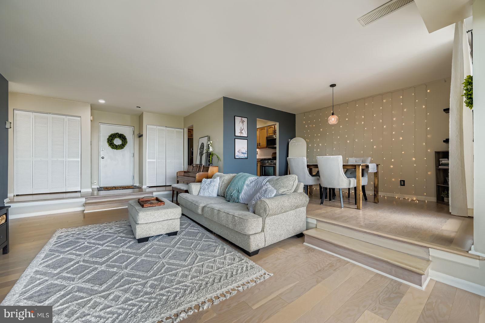 9900 Georgia Avenue, Unit 27716 Silver Spring, MD 20902 - Photo 9 of 37 a living room with furniture