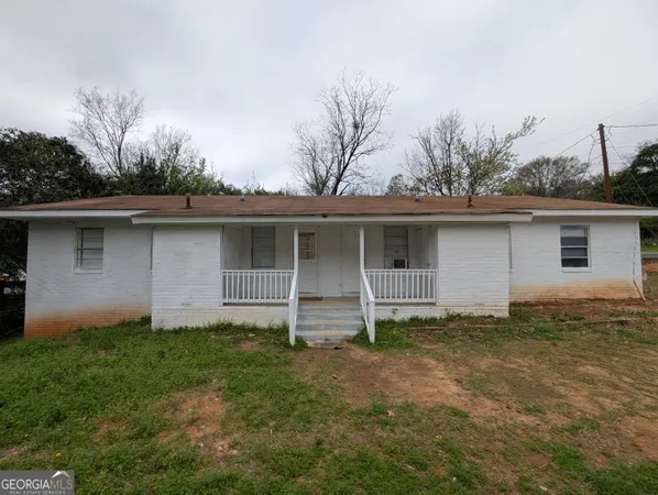 front view of house with a yard