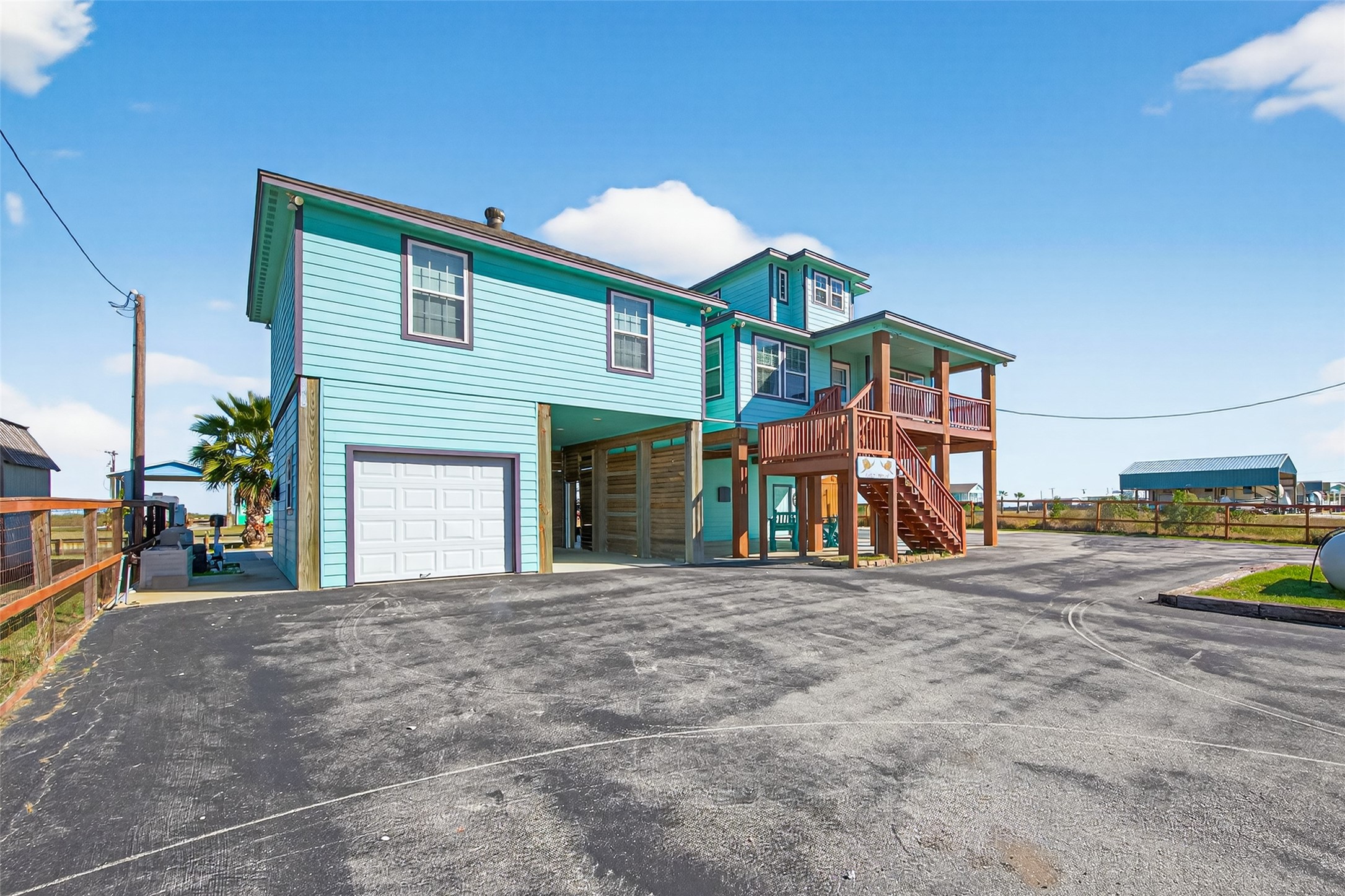 1127 County Road 299 Sargent, TX 77414 - Photo 3 of 46 a view of a house with a patio