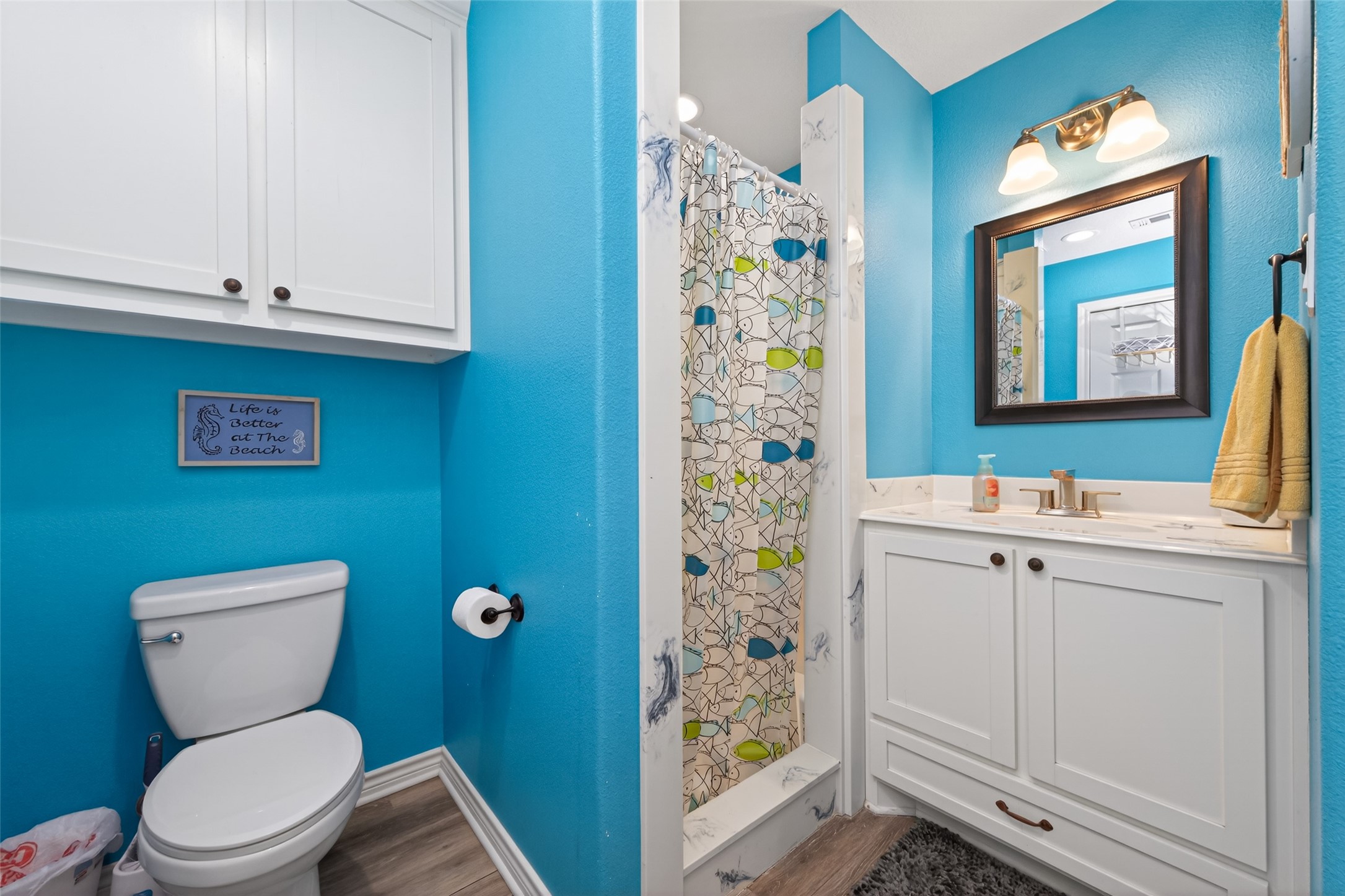 1127 County Road 299 Sargent, TX 77414 - Photo 29 of 46 a bathroom with a toilet sink and shower