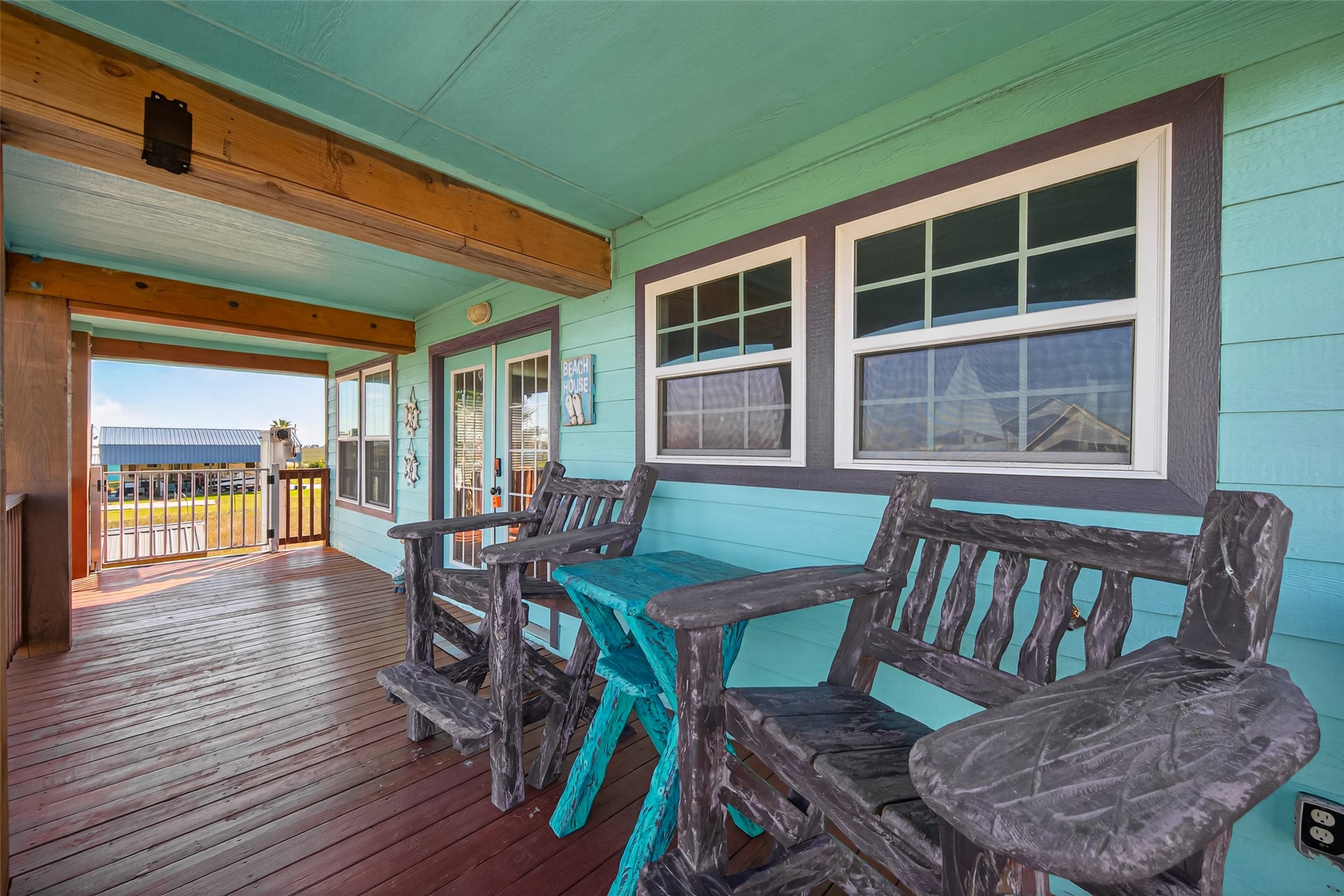 1127 County Road 299 Sargent, TX 77414 - Photo 38 of 46 a view of a dining room with furniture window and wooden floor