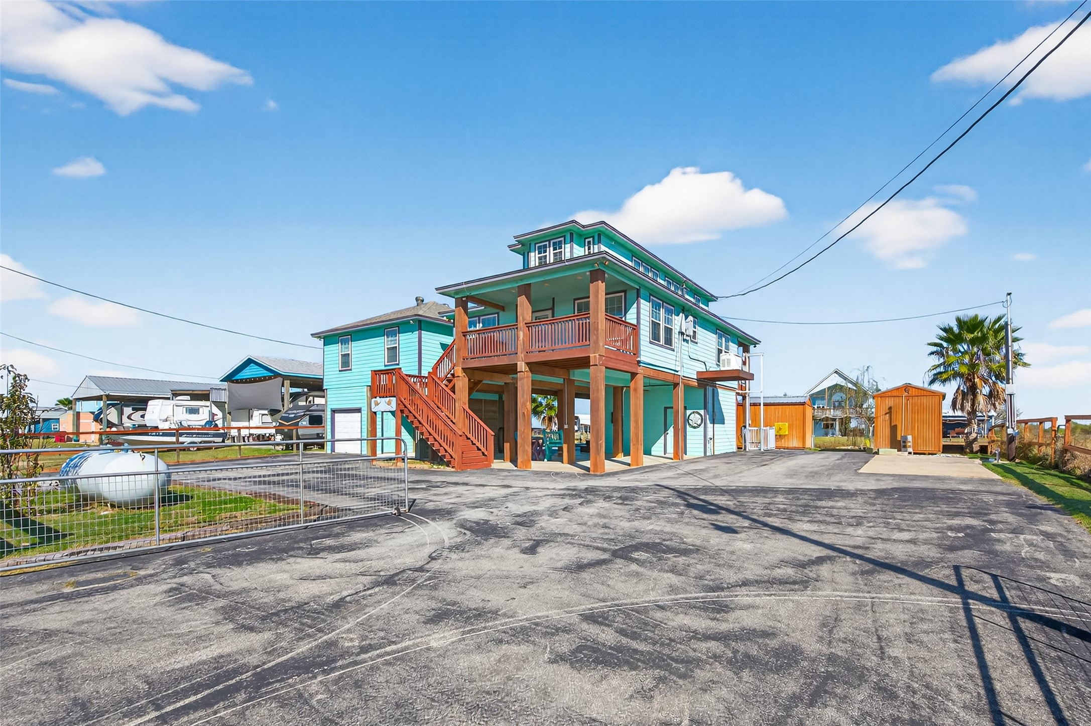1127 County Road 299 Sargent, TX 77414 - Photo 6 of 46 a view of a basketball room with a table and chairs