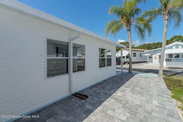 a view of a house with a patio