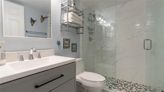 a view of multiple houses with a yard