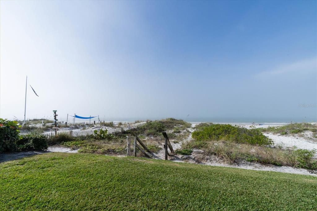 19930 Gulf Boulevard, Unit 5C Indian Shores, FL 33785 - Photo 42 of 55 a view of a field with ocean view