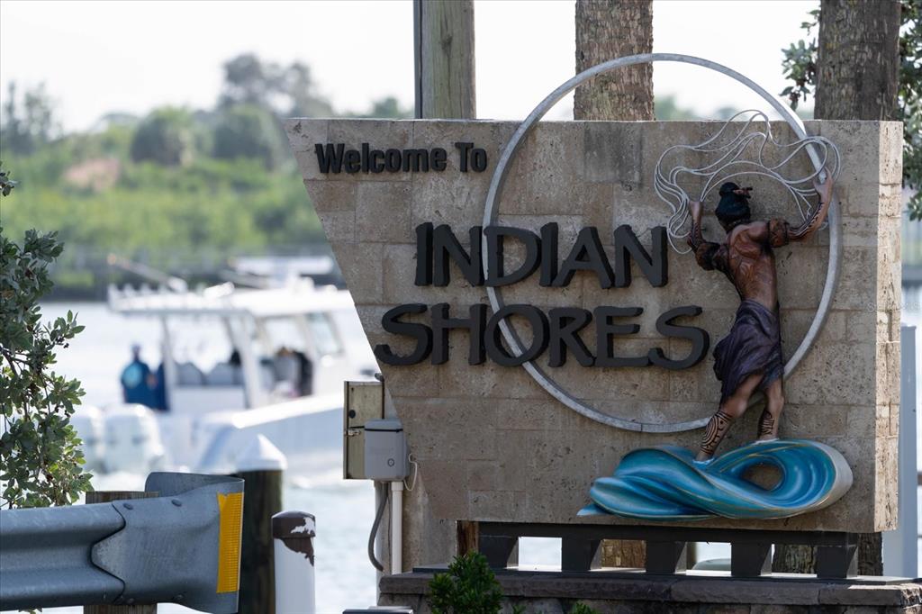 19930 Gulf Boulevard, Unit 5C Indian Shores, FL 33785 - Photo 44 of 55 a view of a house with backyard and sitting area