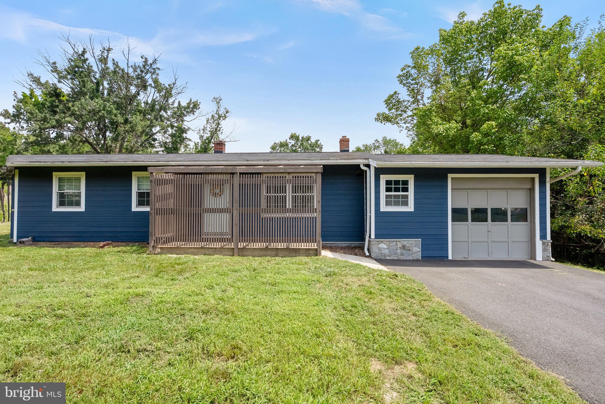 21506 Shellhorn Road Ashburn, VA 20147 - Photo 1 of 42 a front view of a house with yard