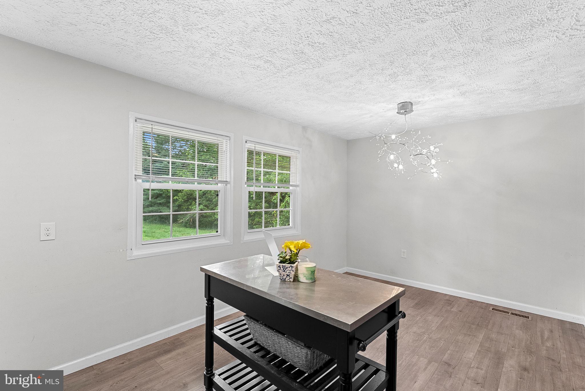 21506 Shellhorn Road Ashburn, VA 20147 - Photo 20 of 42 a workspace with furniture and a window