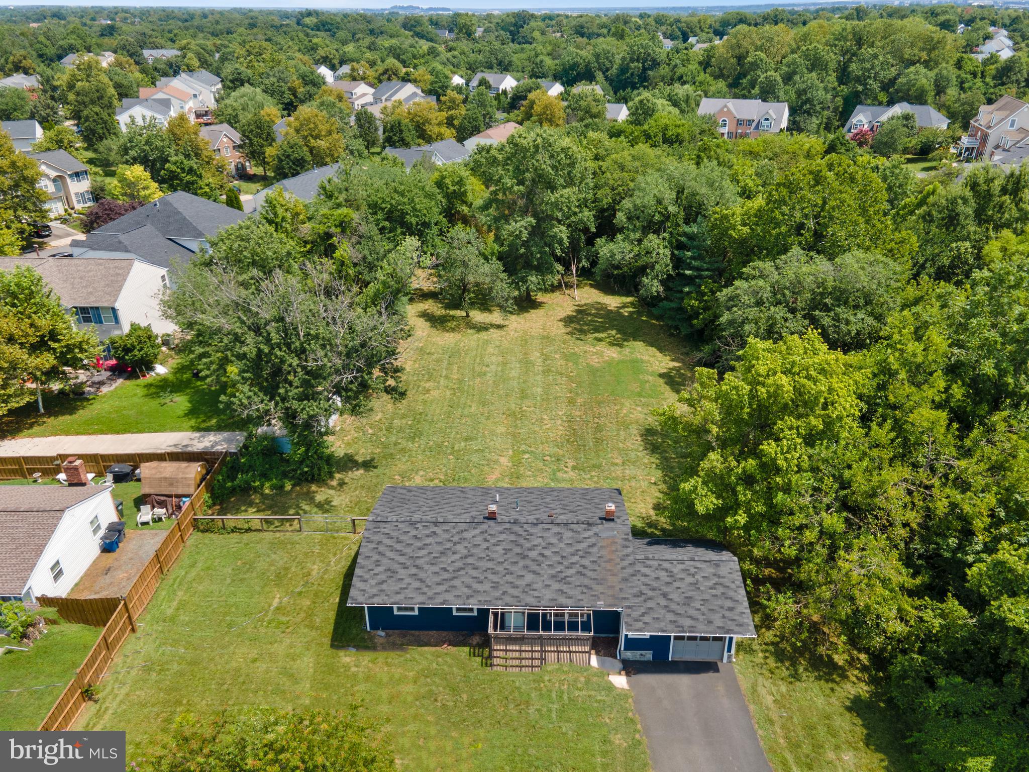 21506 Shellhorn Road Ashburn, VA 20147 - Photo 2 of 42 an aerial view of a house having yard