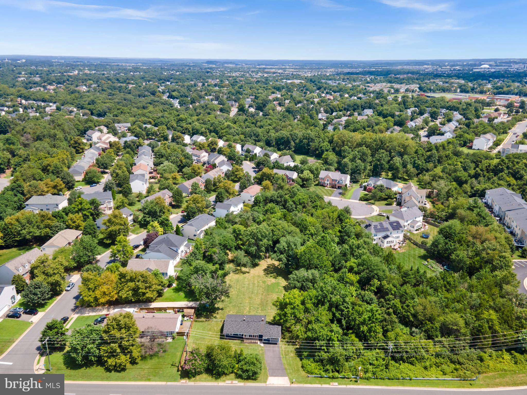 21506 Shellhorn Road Ashburn, VA 20147 - Photo 38 of 42 an aerial view of residential houses with outdoor space and trees