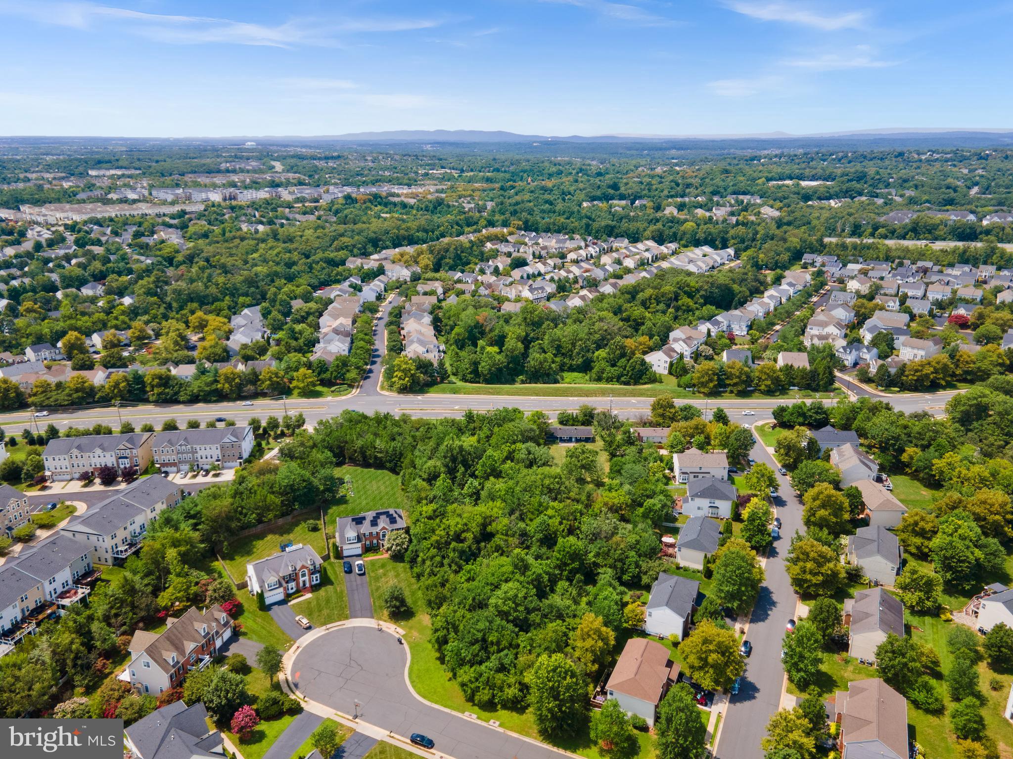 21506 Shellhorn Road Ashburn, VA 20147 - Photo 39 of 42 an aerial view of a houses with a yard