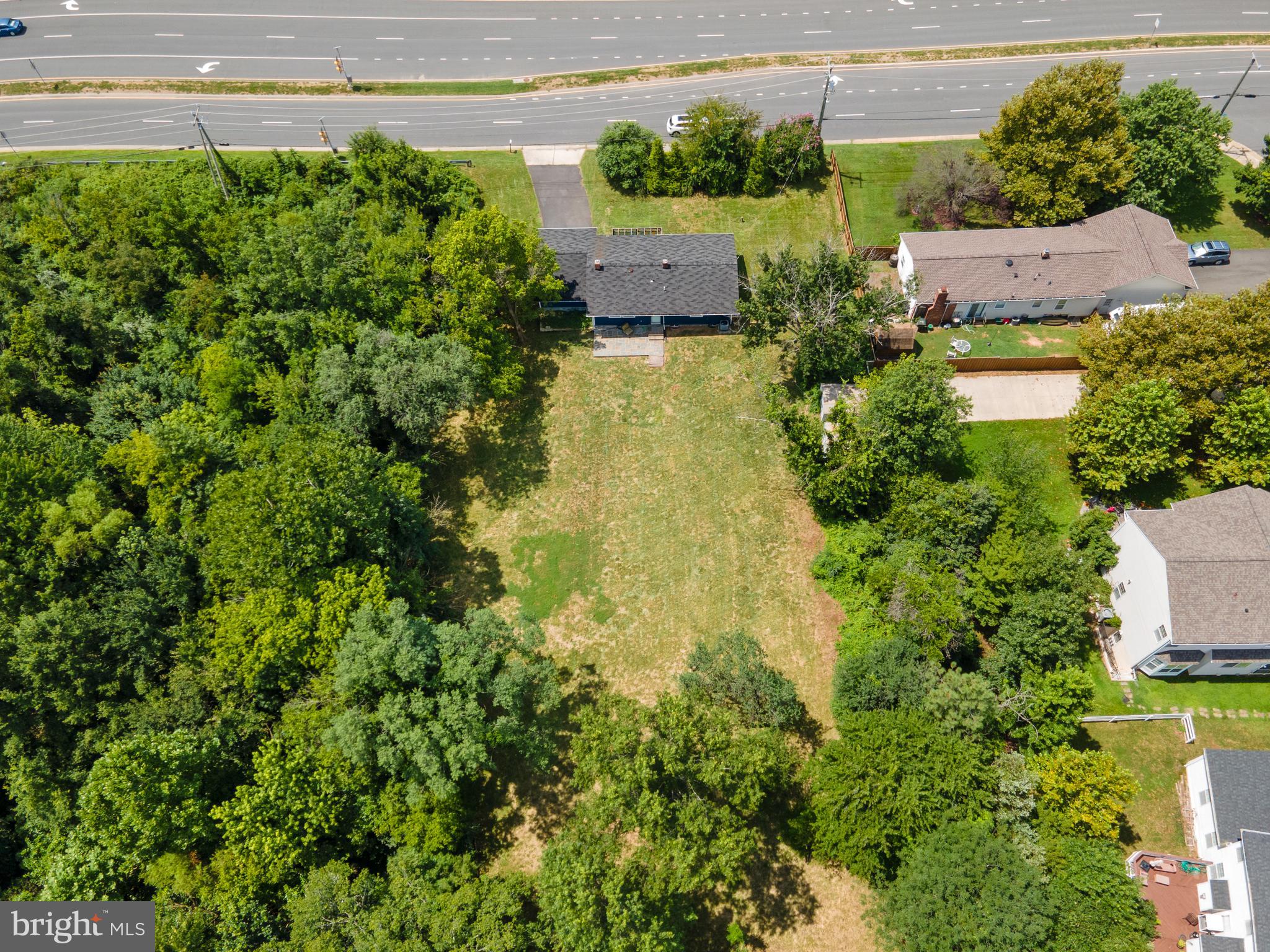 21506 Shellhorn Road Ashburn, VA 20147 - Photo 41 of 42 an aerial view of residential houses with plants and large trees
