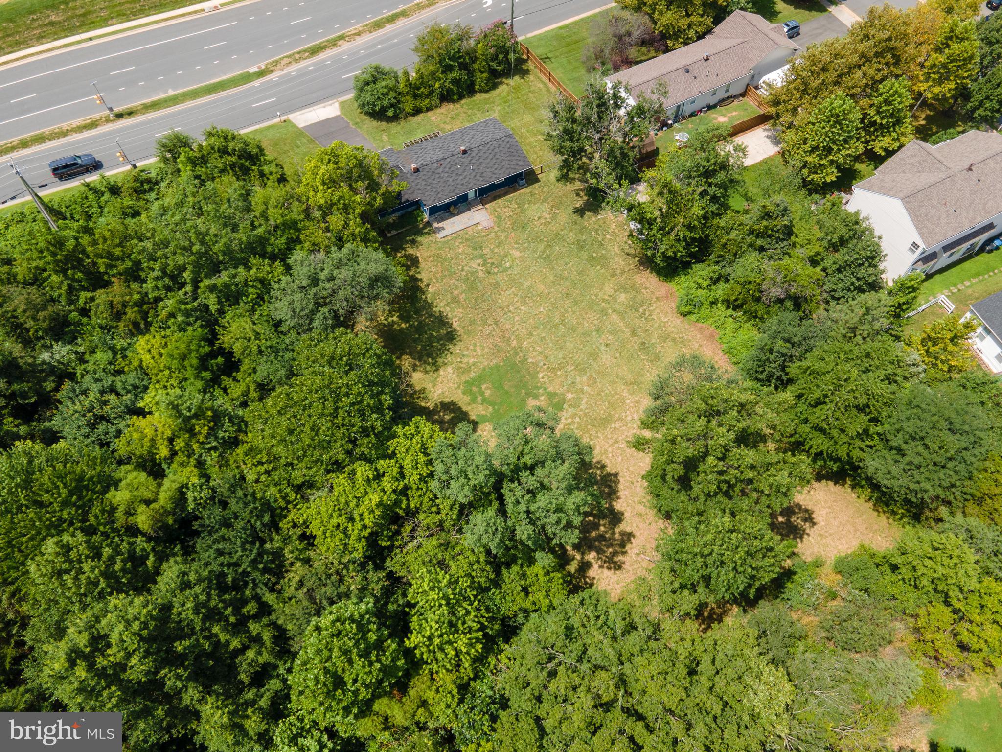 21506 Shellhorn Road Ashburn, VA 20147 - Photo 42 of 42 an aerial view of residential house with outdoor space and trees all around