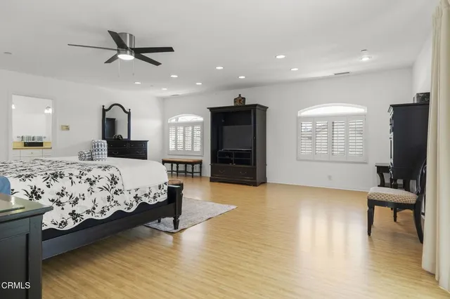a view of balcony with wooden floor