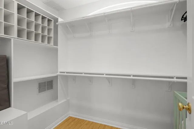 an aerial view of residential building with parking