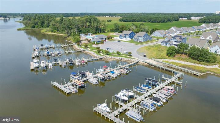 31250 Anchor Watch Loop, Unit 78 Dagsboro, DE 19939 - Photo 5 of 5 a view of a lake with a mountain view