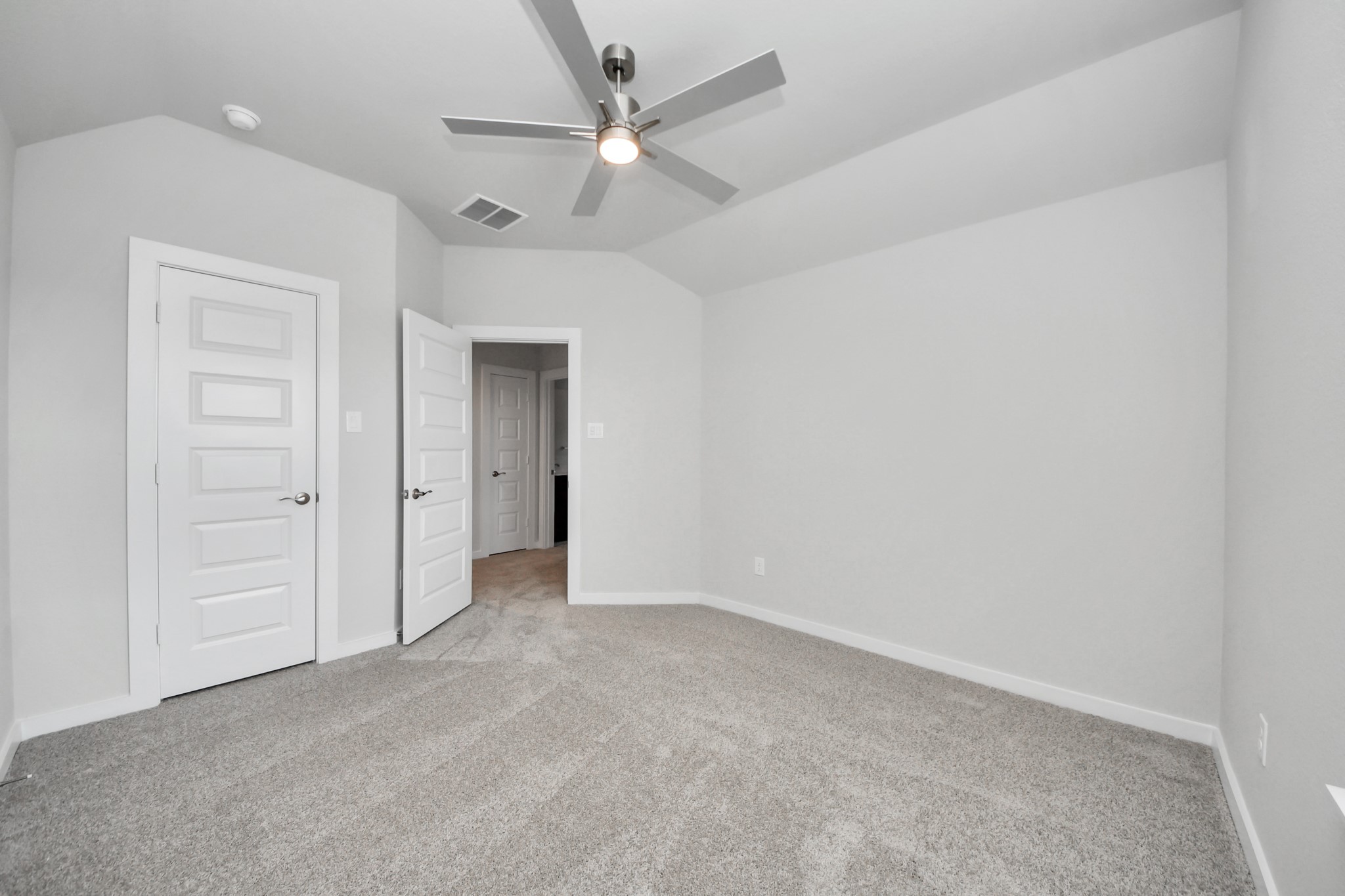 3110 Native Spg Drive Spring, TX 77373 - Photo 25 of 34 Generously sized secondary bedrooms featuring spacious closets, soft and inviting carpeting underfoot, large windows allowing plenty of natural light, and the added touch of privacy blinds for your personal retreat. Sample photo of completed home with similar floor plan. Actual colors and selections may vary.
