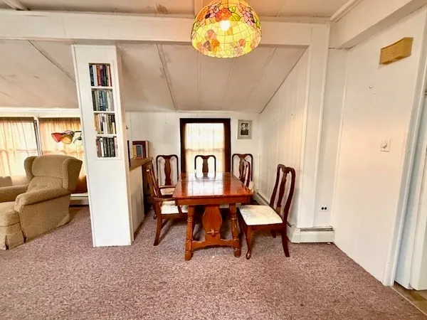 a view of a livingroom with furniture and a couch