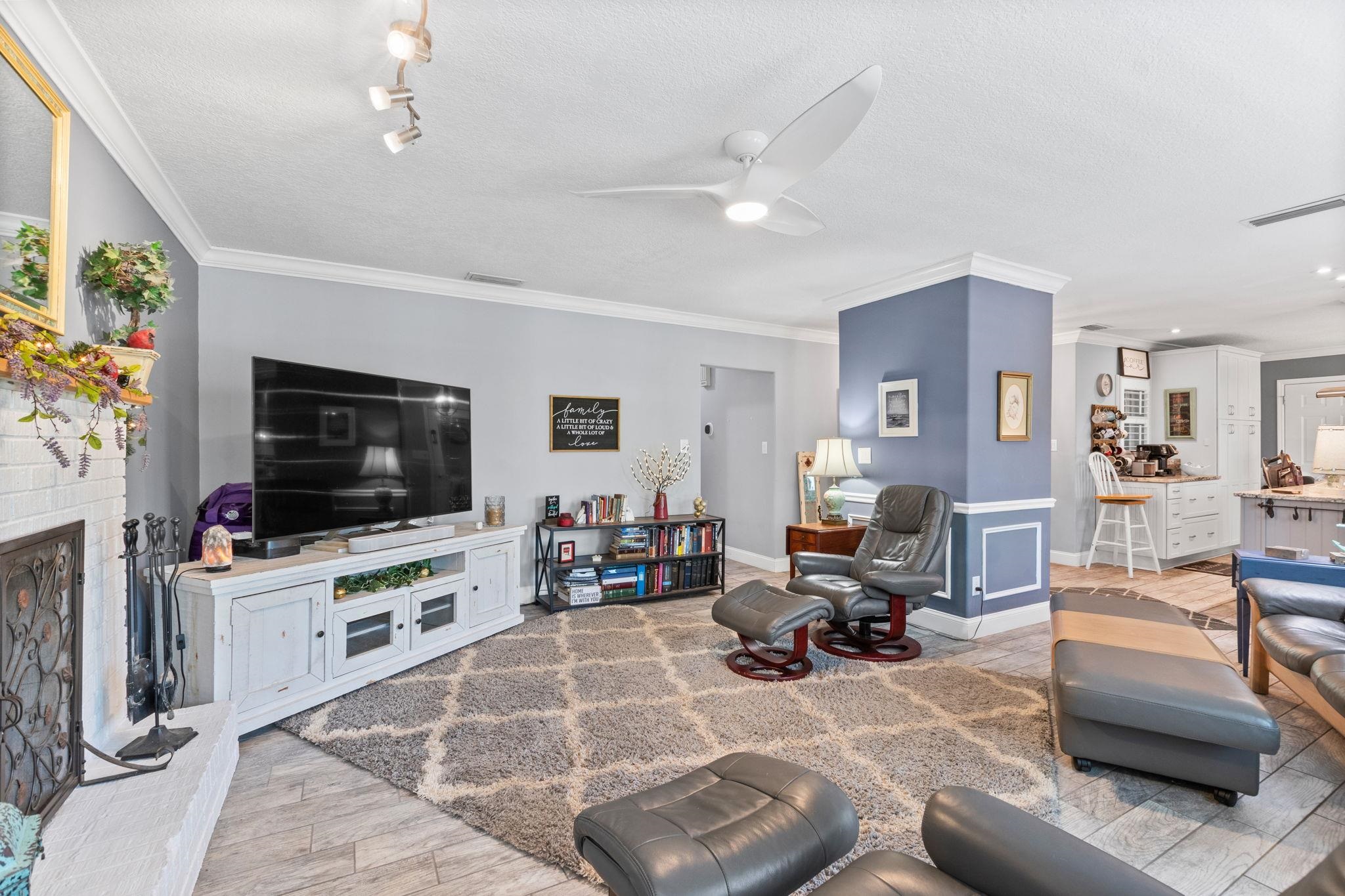 5312 Riverview Drive St. Augustine, FL 32080 - Photo 14 of 54 a living room with furniture and a flat screen tv