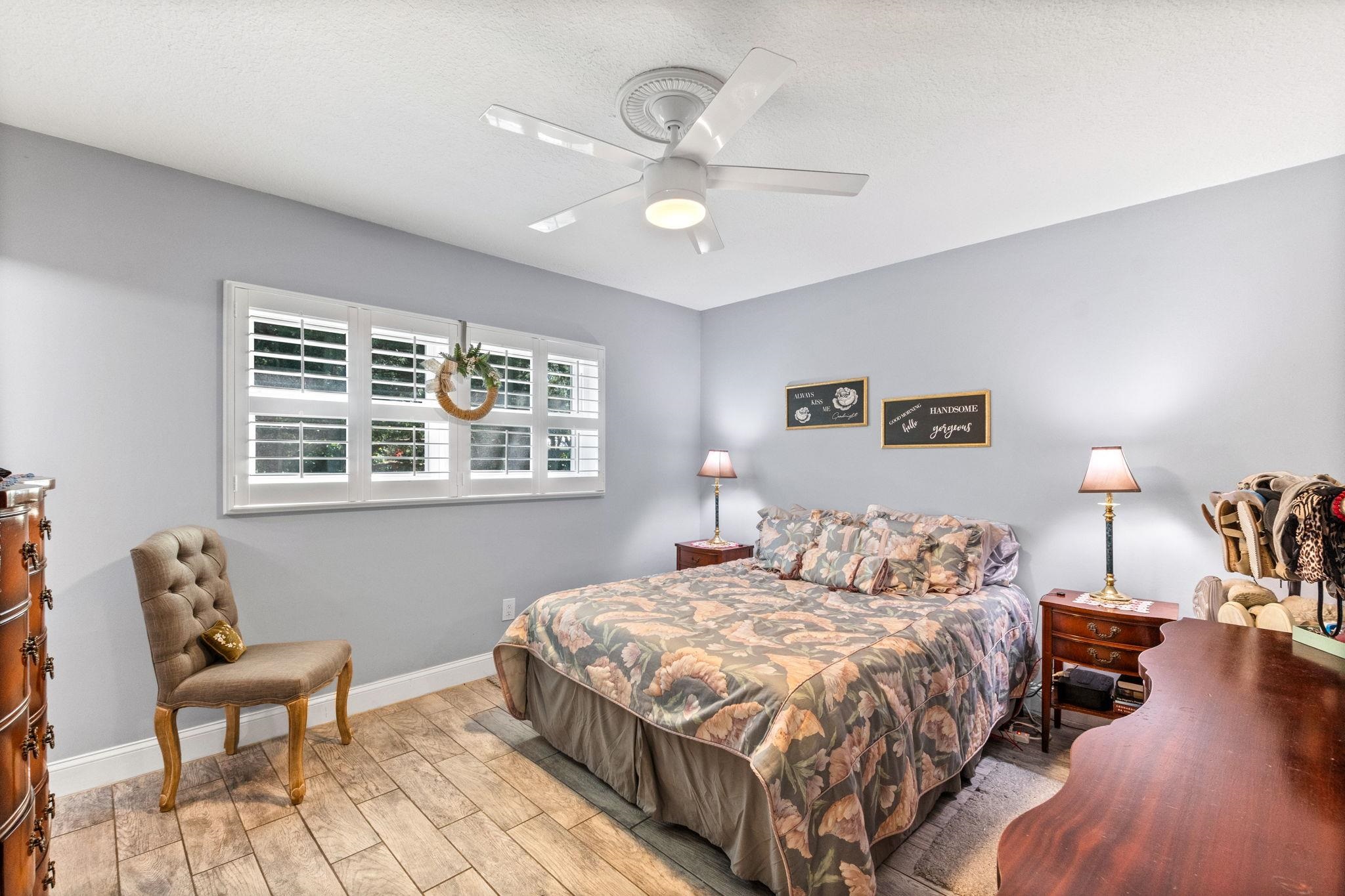 5312 Riverview Drive St. Augustine, FL 32080 - Photo 34 of 54 a bedroom with a bed and a chair