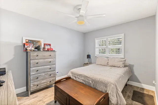 a view of room with guitars and book shelf