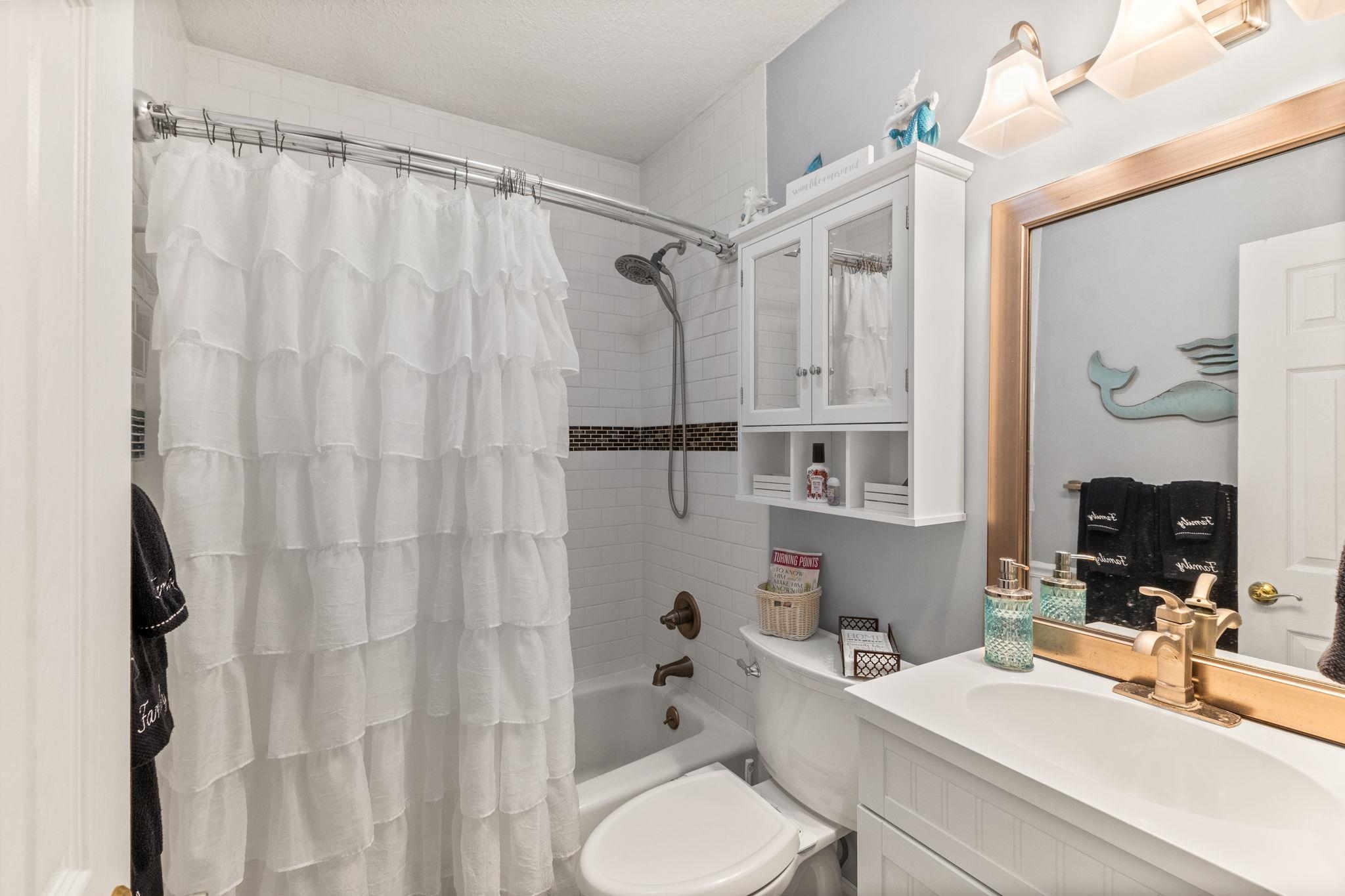 5312 Riverview Drive St. Augustine, FL 32080 - Photo 38 of 54 a bathroom with a sink toilet and shower