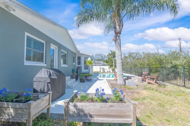an aerial view of house with outdoor space