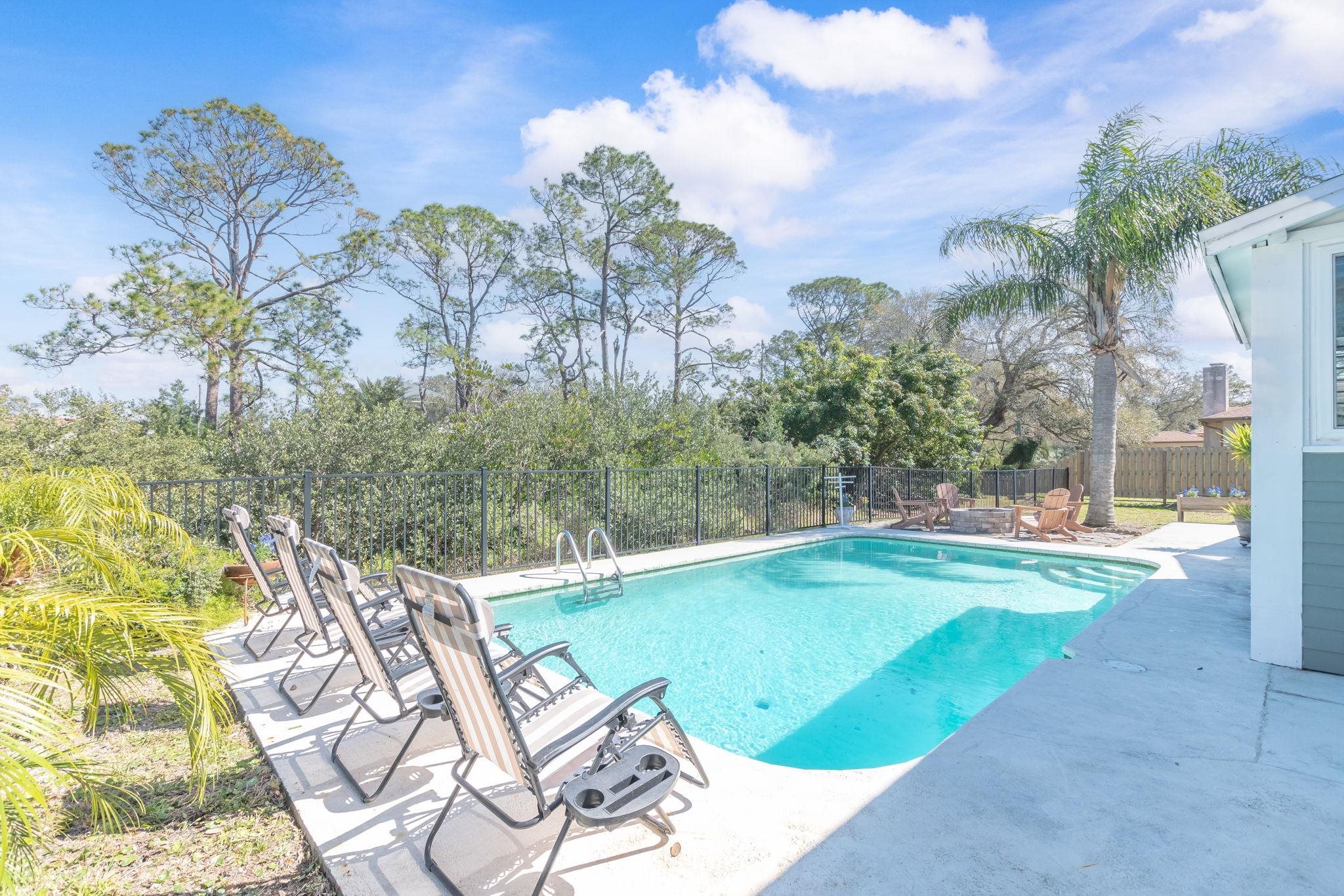 5312 Riverview Drive St. Augustine, FL 32080 - Photo 43 of 54 a view of a swimming pool with lounge chair