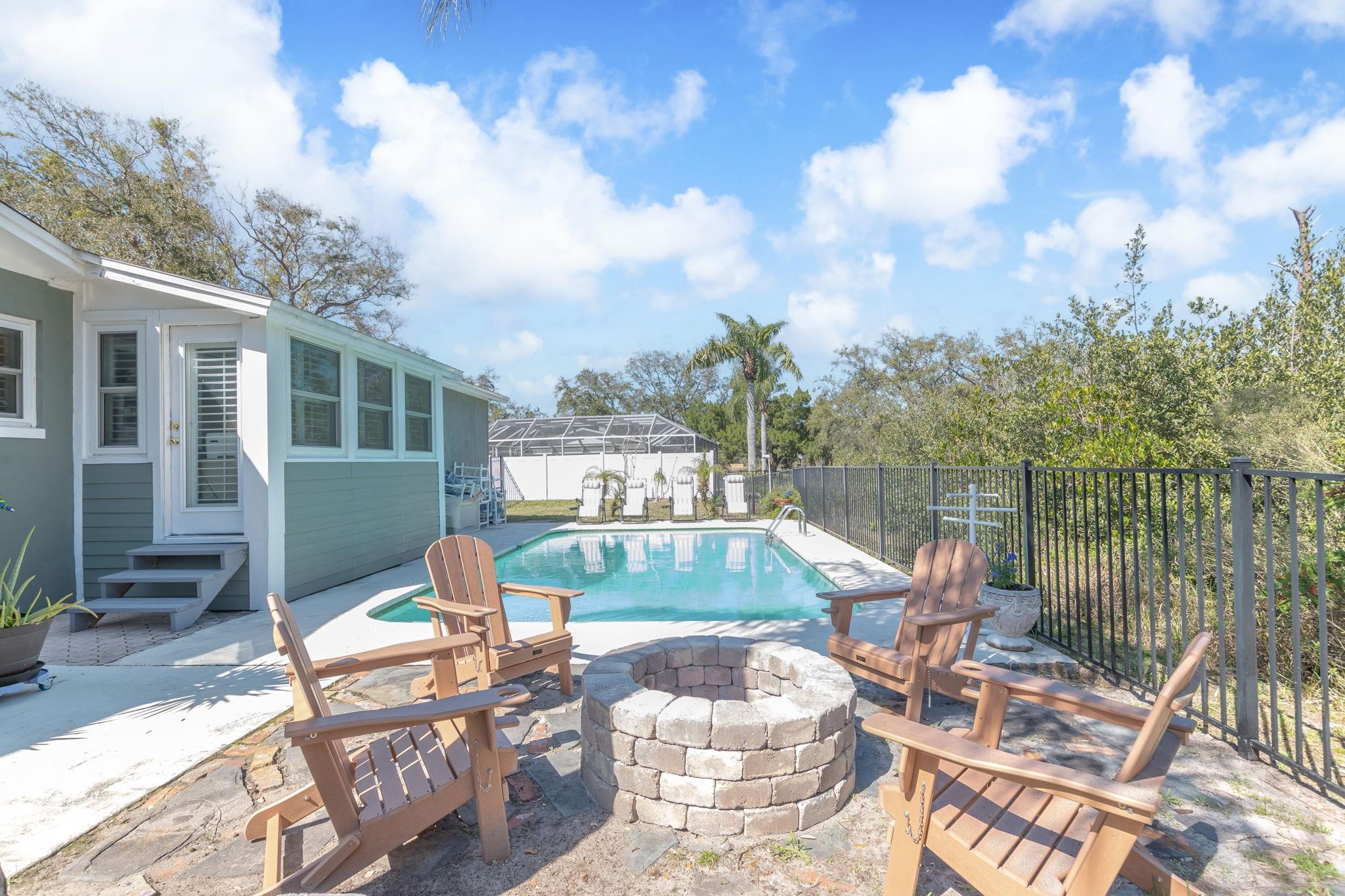 5312 Riverview Drive St. Augustine, FL 32080 - Photo 45 of 54 a view of a patio with couches chairs and a potted plant