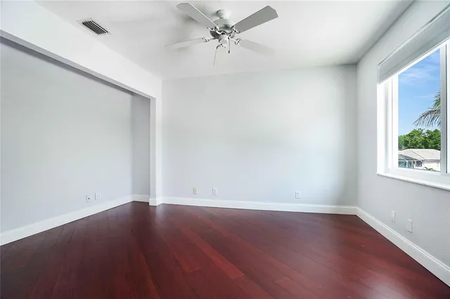 a bathroom with a double vanity sink bathtub and a mirror
