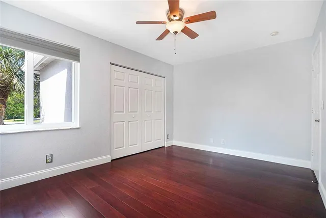 a bathroom with a sink vanity and mirror
