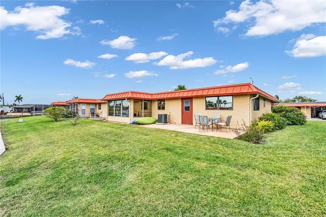 front view of a house with a big yard