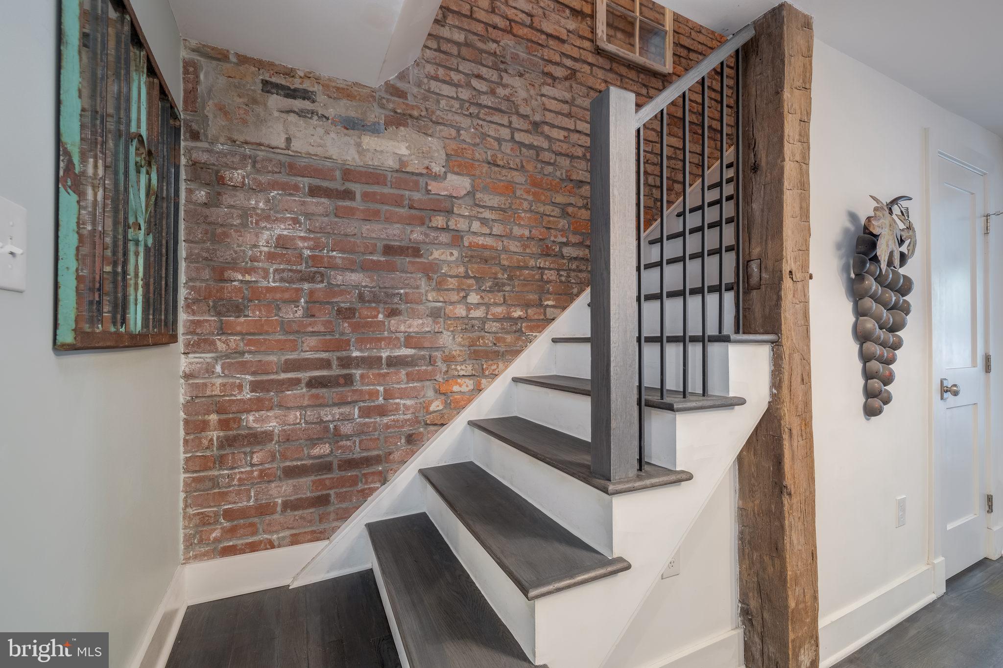 601 South St Asaph Street Alexandria, VA 22314 - Photo 22 of 47 Exposed Brick up to Bedrooms