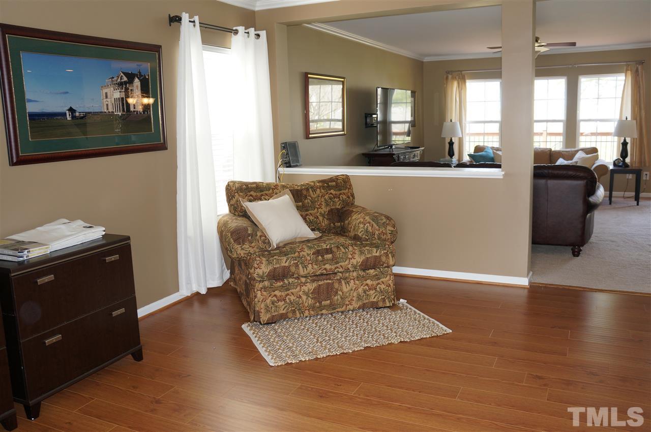 177 Ryder Cup Circle Raleigh, NC 27603 - Photo 12 of 25 View 2 of the "living room" showing how it opens up to the family room! I've seen this room set up as a formal dining area, office and so much more!