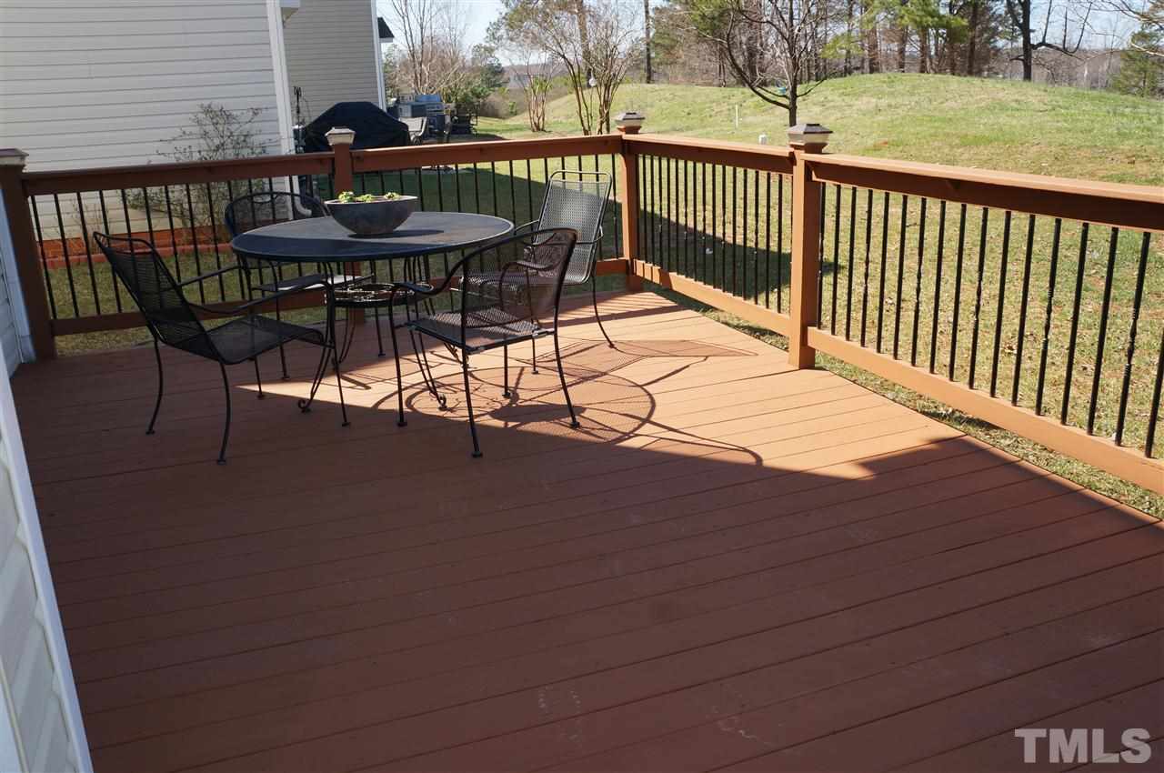 177 Ryder Cup Circle Raleigh, NC 27603 - Photo 5 of 25 Large deck with wrought iron railings and fresh deck paint. What a great place to entertain your guests or just have a quiet place to read. And, it's shaded from the afternoon sun!