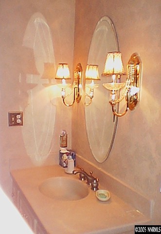1000 Beck Drive Reno, NV 89509 - Photo 7 of 7 a bathroom with a sink and a mirror