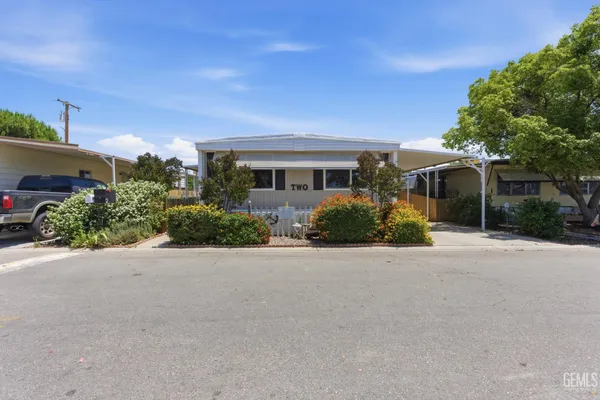 front view of a house with a street