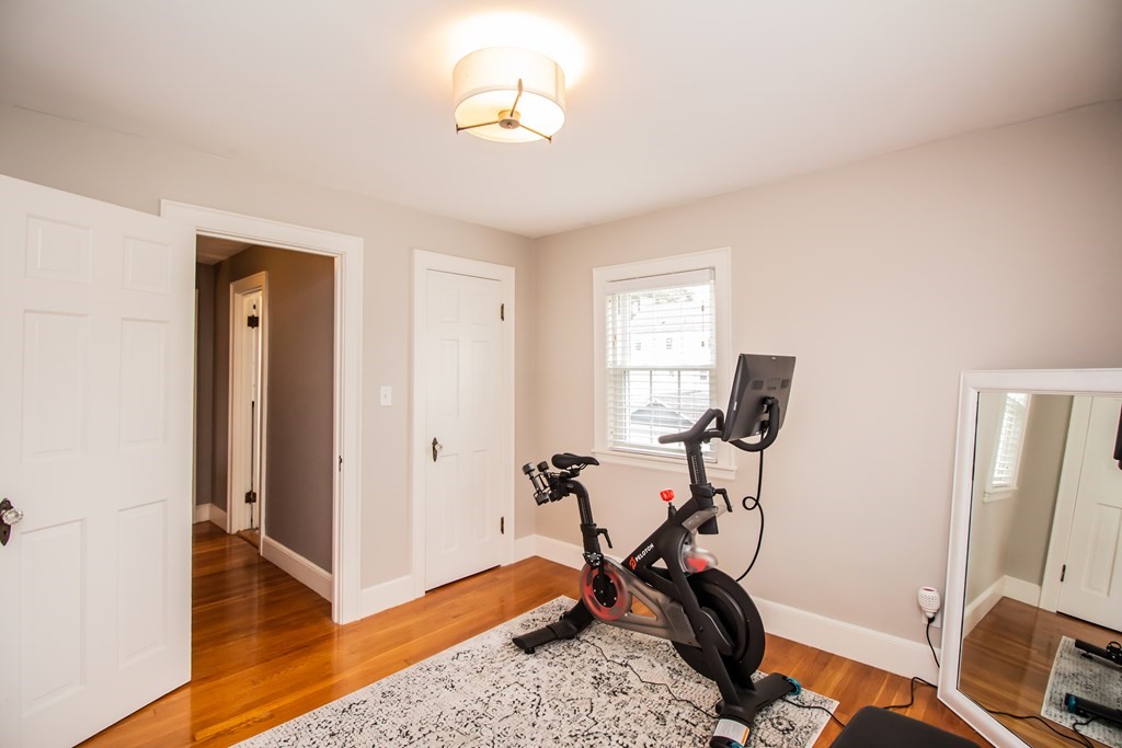 66 Howitt Road Boston, MA 02132 - Photo 15 of 24 a view of a room with gym equipment