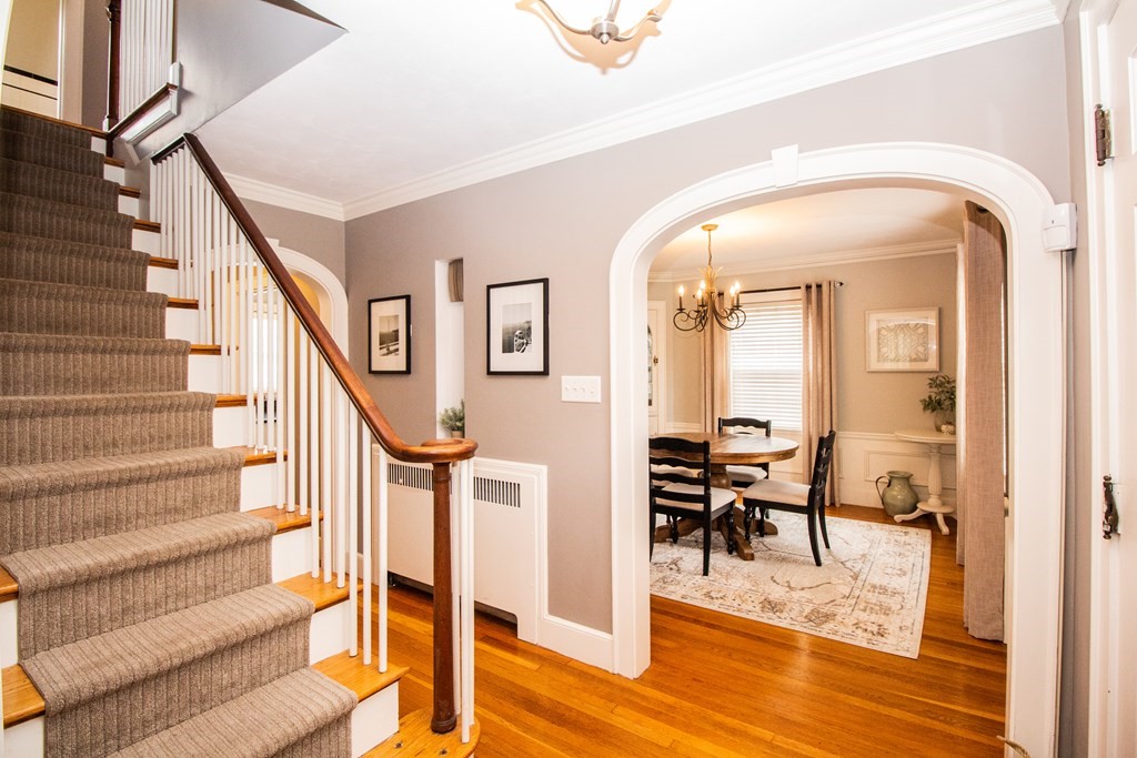 66 Howitt Road Boston, MA 02132 - Photo 17 of 24 a view of entryway and hall with wooden floor