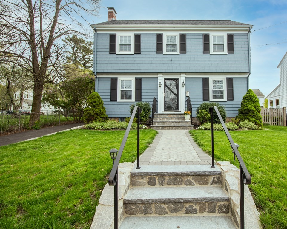 66 Howitt Road Boston, MA 02132 - Photo 21 of 24 a view of a house with a yard