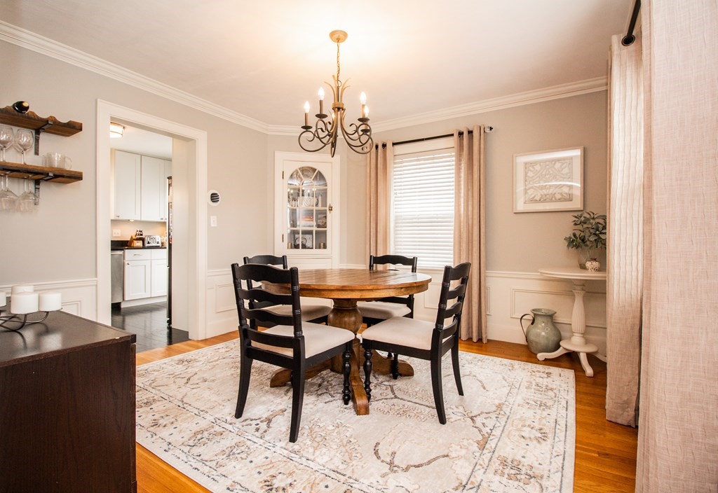 66 Howitt Road Boston, MA 02132 - Photo 6 of 24 a dining room with furniture and window
