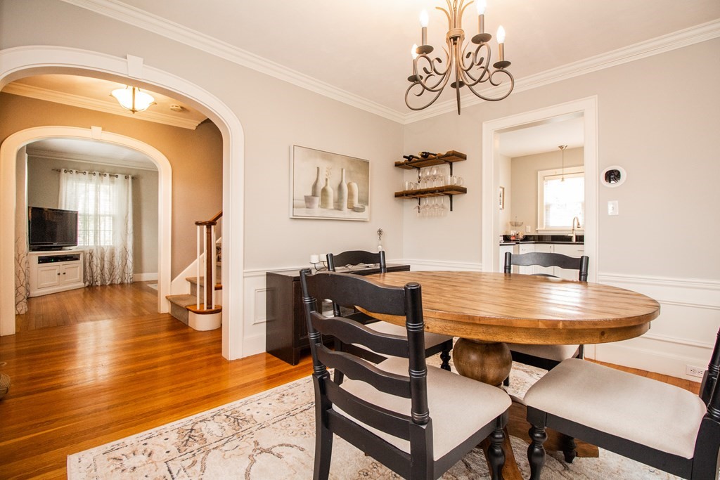 66 Howitt Road Boston, MA 02132 - Photo 7 of 24 a dining room with furniture and wooden floor