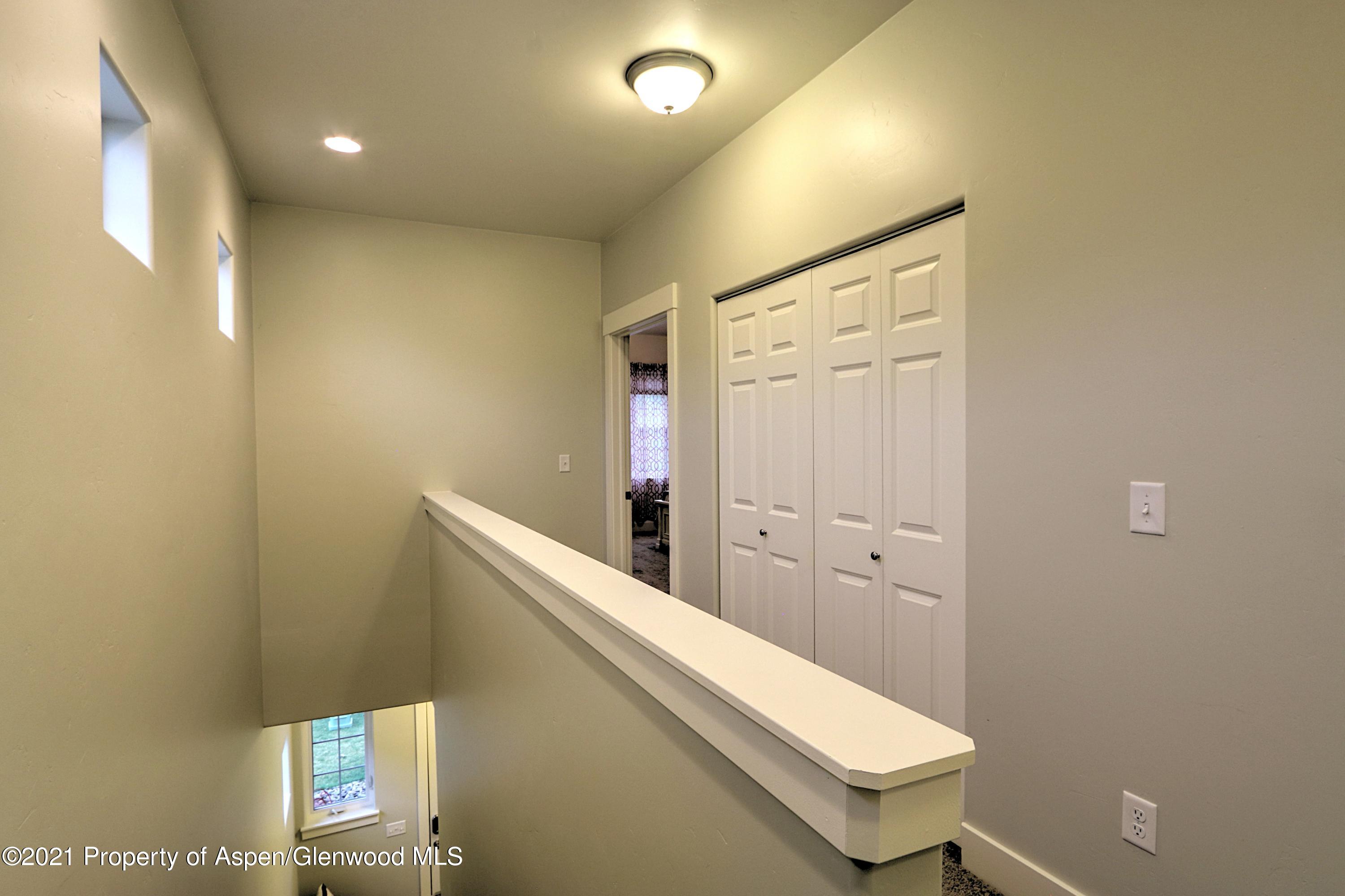 840 West 24th Street Rifle, CO 81650 - Photo 11 of 19 upper level hallway