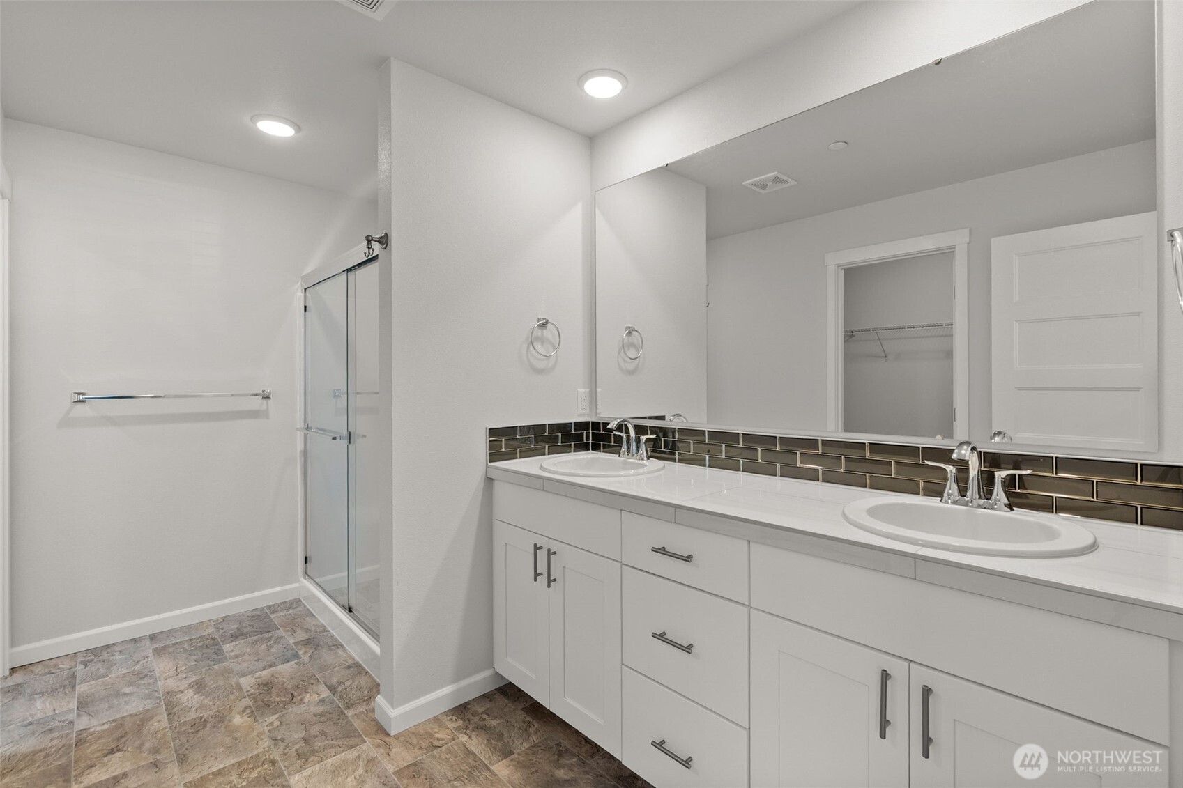 9116 Carlos Way Northeast Lacey, WA 98516 - Photo 22 of 34 a bathroom with a double vanity sink mirror and