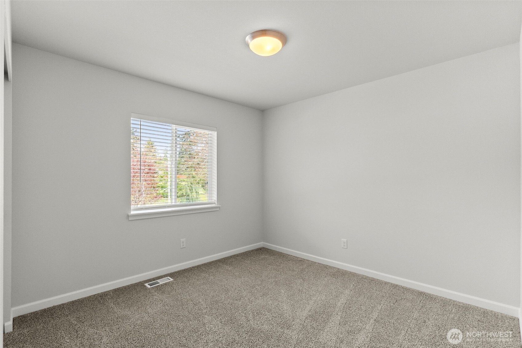 9116 Carlos Way Northeast Lacey, WA 98516 - Photo 27 of 34 an empty room with windows