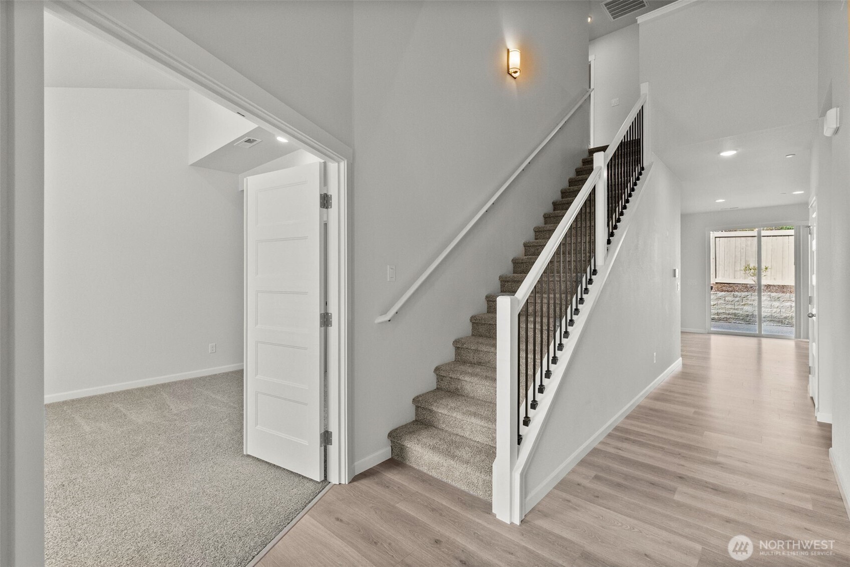 9116 Carlos Way Northeast Lacey, WA 98516 - Photo 3 of 34 a view of staircase with wooden floor and staircase