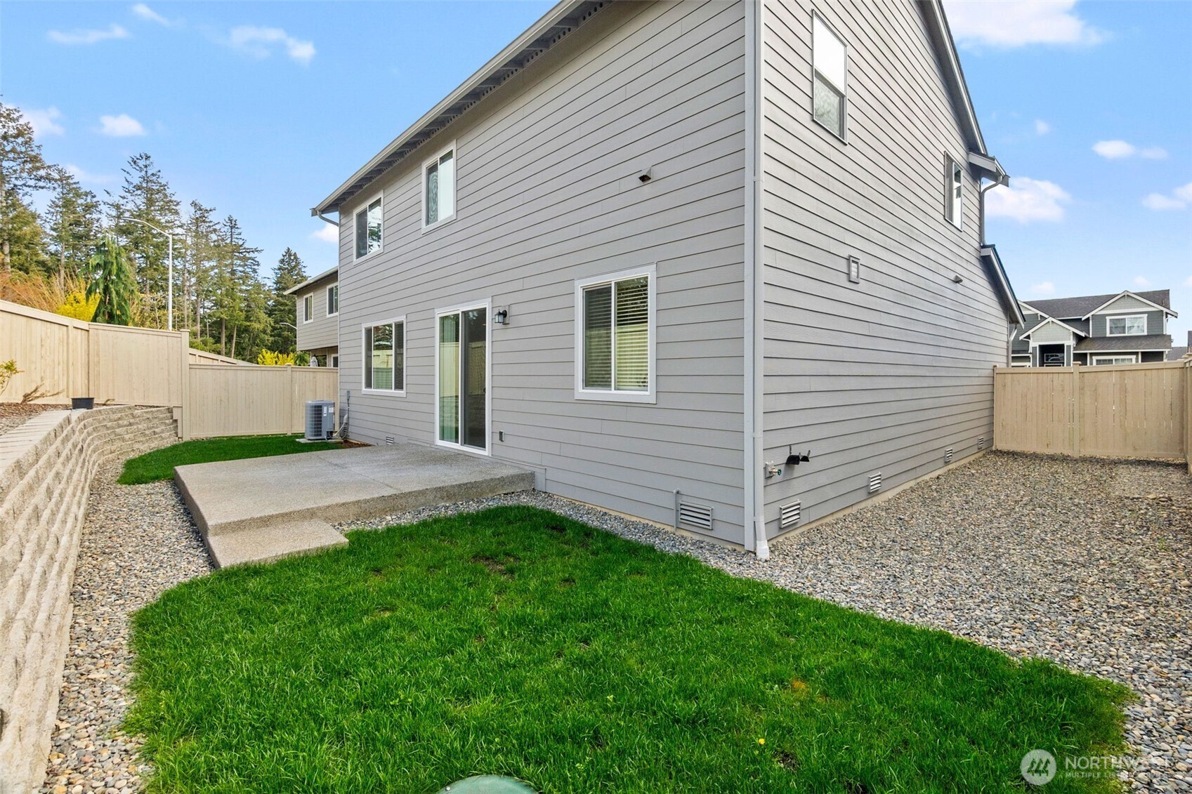 9116 Carlos Way Northeast Lacey, WA 98516 - Photo 33 of 34 a view of a house with a backyard