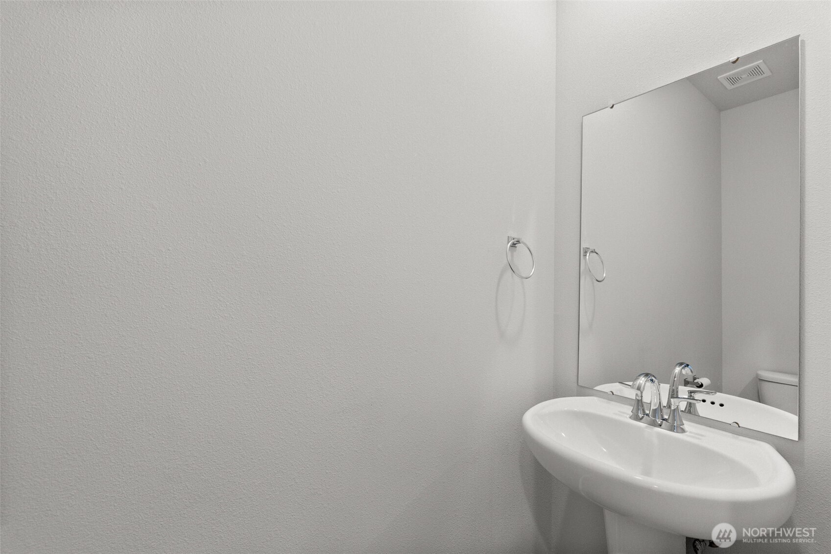 9116 Carlos Way Northeast Lacey, WA 98516 - Photo 10 of 34 a bathroom with a sink and a mirror