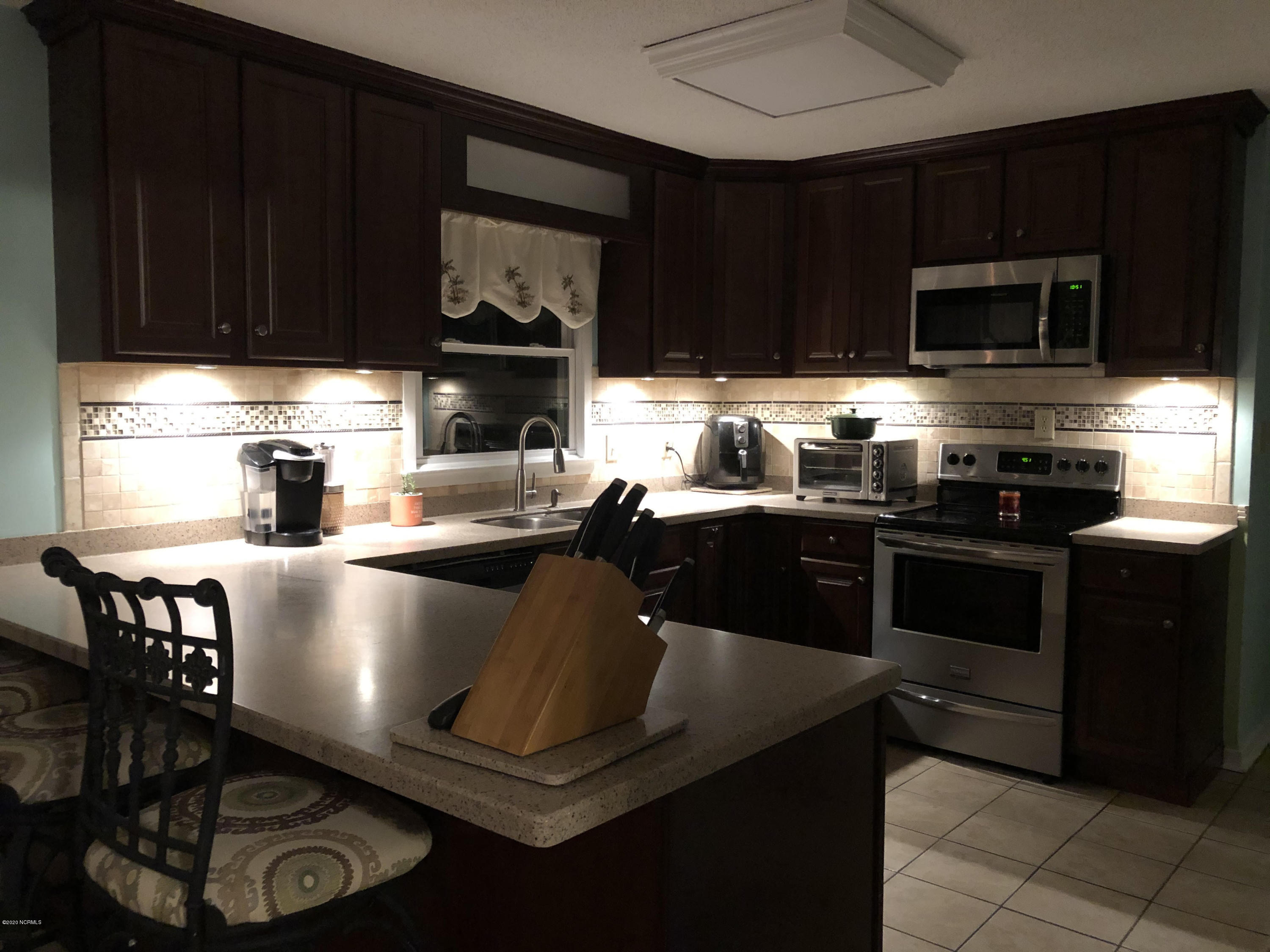 1806 Paulette Road Morehead City, NC 28557 - Photo 13 of 39 under cabinet lighting is a great touch