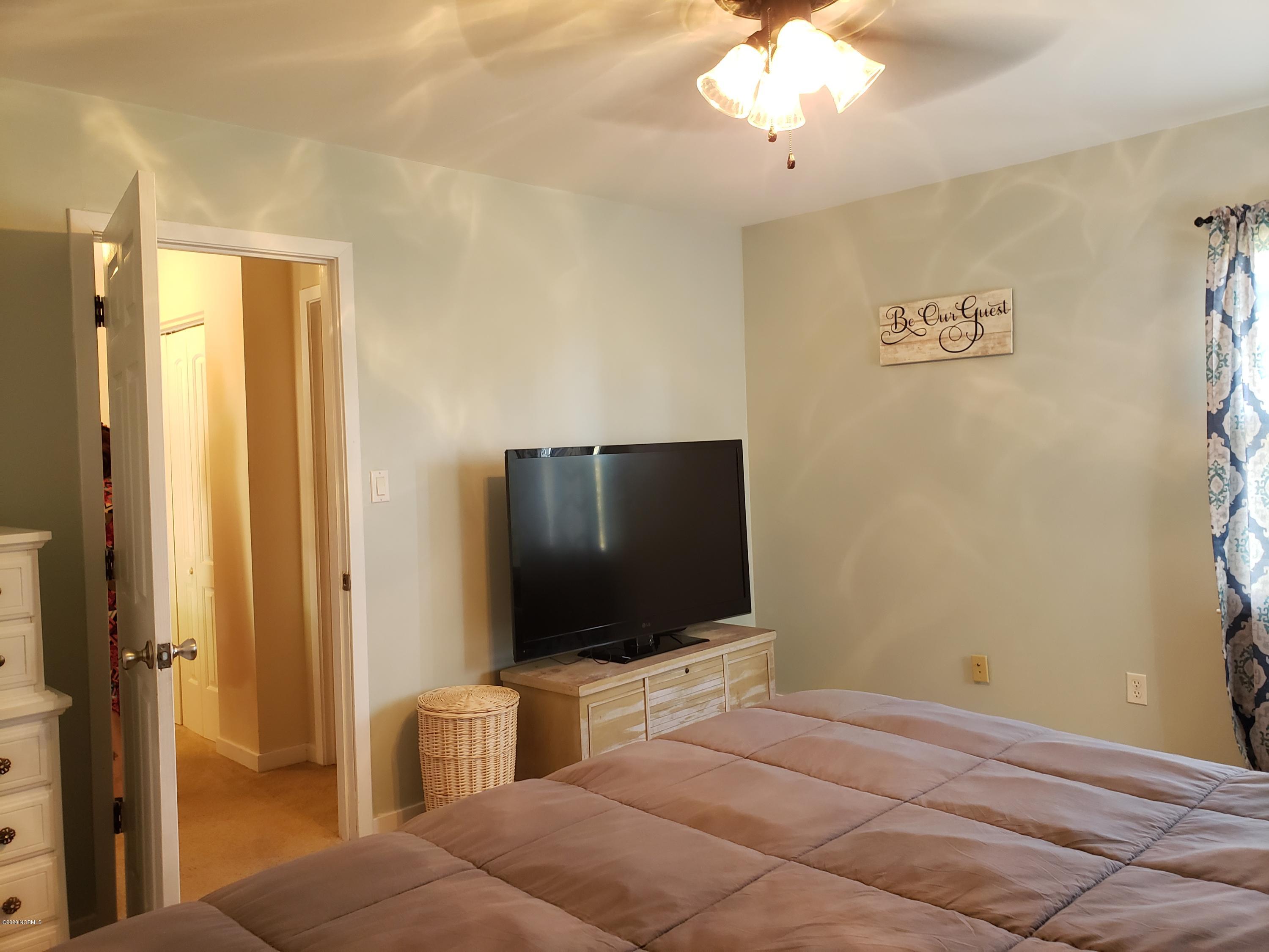 1806 Paulette Road Morehead City, NC 28557 - Photo 20 of 39 Bedroom 2 is spacious with a huge walk in closet